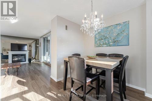 1103 - 10 Muirhead Road, Toronto, ON - Indoor Photo Showing Dining Room With Fireplace