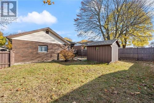 View of yard featuring a storage unit - 118 Oak Street, Simcoe, ON 