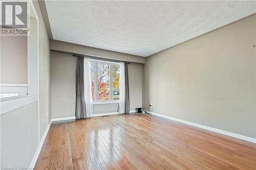 Empty room with light hardwood / wood-style flooring - 118 Oak Street, Simcoe, ON 