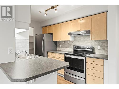 3221 Centennial Drive Unit# 210, Vernon, BC - Indoor Photo Showing Kitchen With Stainless Steel Kitchen With Double Sink