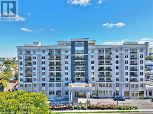 5698 Main Street, Niagara Falls, ON - Outdoor With Balcony With Facade