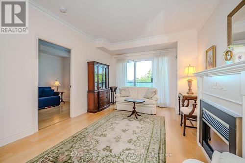 705 - 1 Lomond Drive, Toronto, ON - Indoor With Fireplace