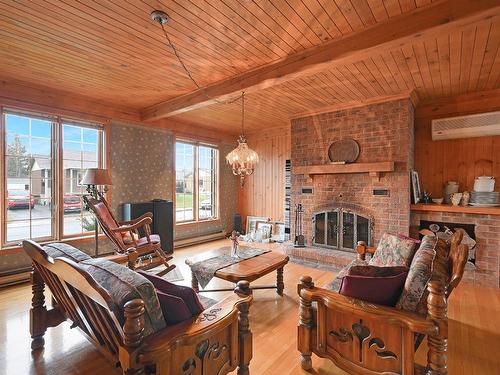 Living room - 700 Rue Bouthillette, Contrecoeur, QC - Indoor Photo Showing Living Room With Fireplace