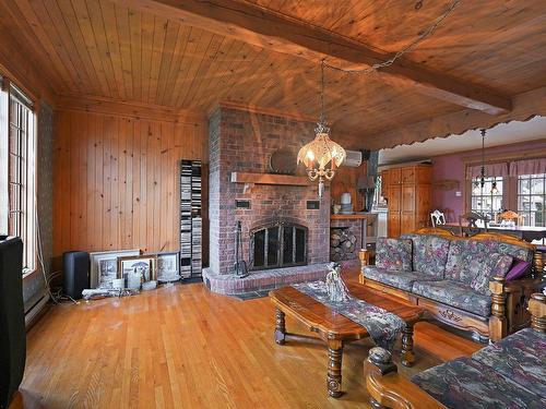 Living room - 700 Rue Bouthillette, Contrecoeur, QC - Indoor Photo Showing Living Room With Fireplace