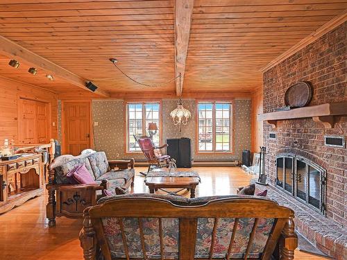 Living room - 700 Rue Bouthillette, Contrecoeur, QC - Indoor Photo Showing Living Room With Fireplace