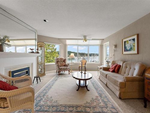 12-2056 White Birch Rd, Sidney, BC - Indoor Photo Showing Living Room With Fireplace