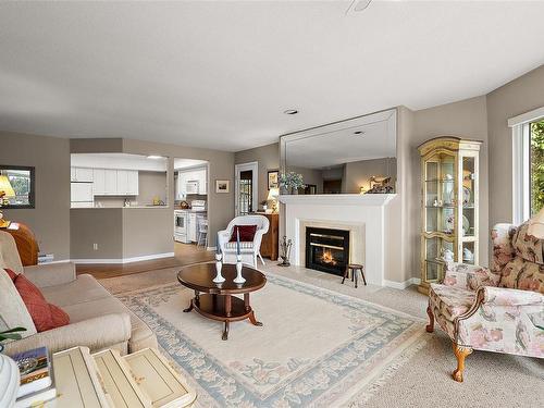 12-2056 White Birch Rd, Sidney, BC - Indoor Photo Showing Living Room With Fireplace