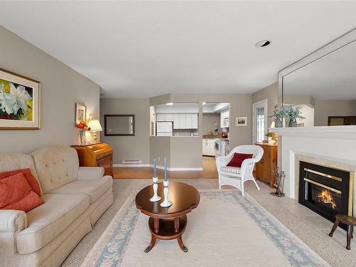 12-2056 White Birch Rd, Sidney, BC - Indoor Photo Showing Living Room With Fireplace