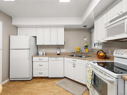 12-2056 White Birch Rd, Sidney, BC - Indoor Photo Showing Kitchen With Double Sink