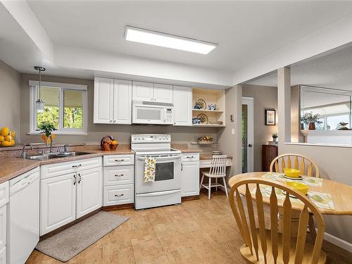 12-2056 White Birch Rd, Sidney, BC - Indoor Photo Showing Kitchen With Double Sink