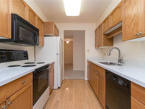 201-3969 Shelbourne St, Saanich, BC - Indoor Photo Showing Kitchen With Double Sink