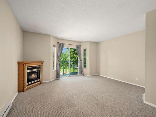 210-2767 Muir Rd, Courtenay, BC - Indoor With Fireplace