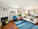 Salon - 102-4665 Av. Colomb, Brossard, QC  - Indoor Photo Showing Living Room With Fireplace 