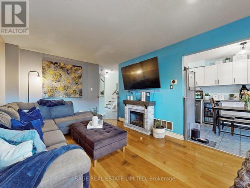 33 Mccullock Crescent, Ajax, ON - Indoor Photo Showing Living Room With Fireplace