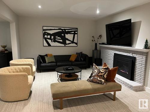 9124 141 St Nw, Edmonton, AB - Indoor Photo Showing Living Room With Fireplace