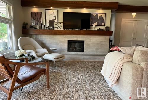 9124 141 St Nw, Edmonton, AB - Indoor Photo Showing Living Room With Fireplace