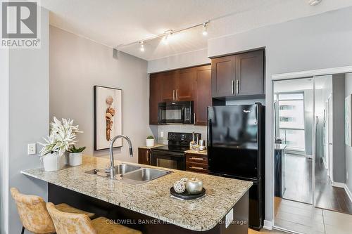 3010 - 4070 Confederation Parkway, Mississauga, ON - Indoor Photo Showing Kitchen With Double Sink