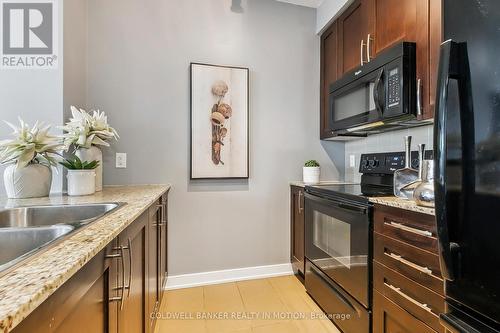 3010 - 4070 Confederation Parkway, Mississauga, ON - Indoor Photo Showing Kitchen With Double Sink