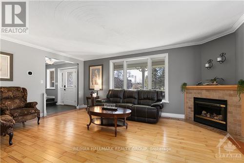 1116 French Settlement Road, North Grenville, ON - Indoor Photo Showing Living Room With Fireplace