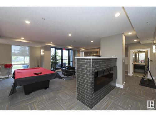 #618 11080 Ellerslie Rd Sw, Edmonton, AB - Indoor With Fireplace