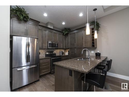 #618 11080 Ellerslie Rd Sw, Edmonton, AB - Indoor Photo Showing Kitchen With Double Sink With Upgraded Kitchen