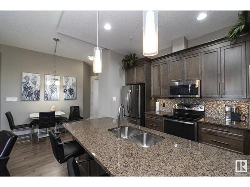 #618 11080 Ellerslie Rd Sw, Edmonton, AB - Indoor Photo Showing Kitchen With Double Sink With Upgraded Kitchen