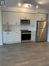 604 - 2550 Simcoe Street N, Oshawa (Windfields), ON  - Indoor Photo Showing Kitchen With Stainless Steel Kitchen 