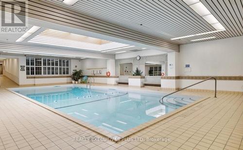 202 - 2175 Marine Drive, Oakville, ON - Indoor Photo Showing Other Room With In Ground Pool