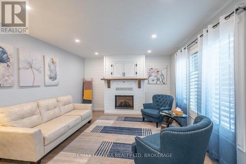 46 Kinross Street, Haldimand, ON - Indoor Photo Showing Living Room With Fireplace