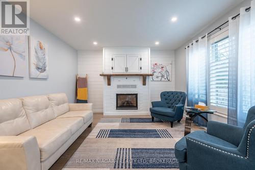 46 Kinross Street, Haldimand, ON - Indoor Photo Showing Living Room With Fireplace