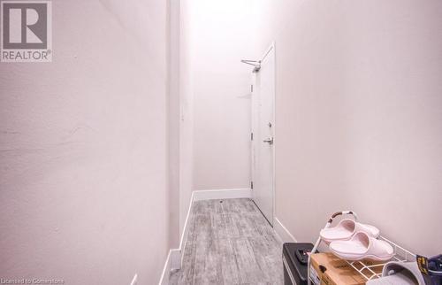 Hallway with light wood-type flooring - 253 Albert Street N Unit# 104, Waterloo, ON - Indoor Photo Showing Other Room