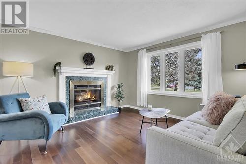 Fire virtually staged - 1284 Ben Royal Avenue, Greely, ON - Indoor Photo Showing Living Room With Fireplace