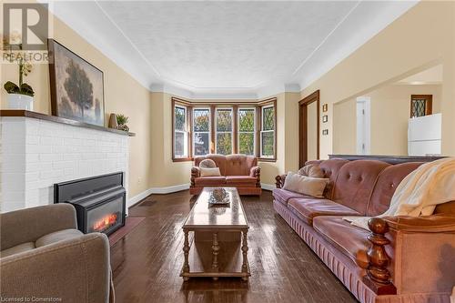 155 Walter Avenue S, Hamilton, ON - Indoor Photo Showing Living Room With Fireplace