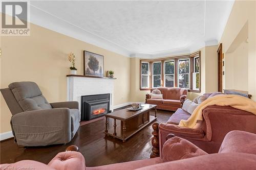 155 Walter Avenue S, Hamilton, ON - Indoor Photo Showing Living Room With Fireplace