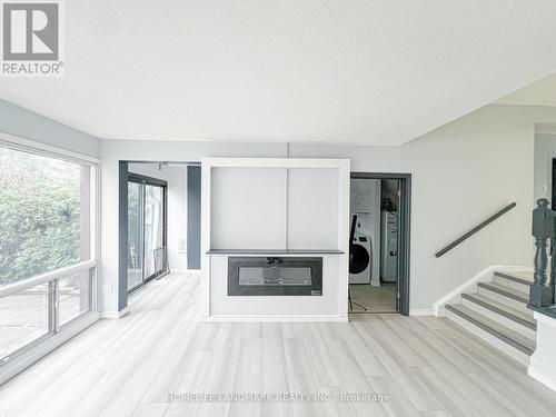 137 - 34 Venetian Crescent, Toronto, ON - Indoor With Fireplace