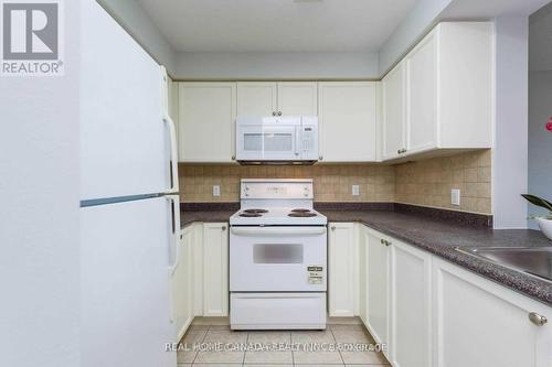 1406 - 4879 Kimbermount Avenue, Mississauga, ON - Indoor Photo Showing Kitchen