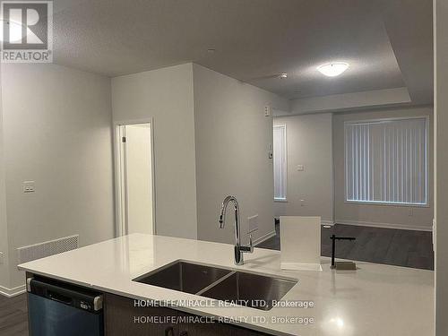 189 - 141 Honeycrisp Crescent, Vaughan, ON - Indoor Photo Showing Kitchen With Double Sink