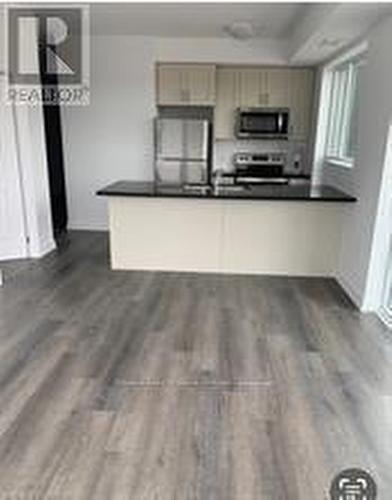 246 - 5055 Greenlane Road, Lincoln, ON - Indoor Photo Showing Kitchen