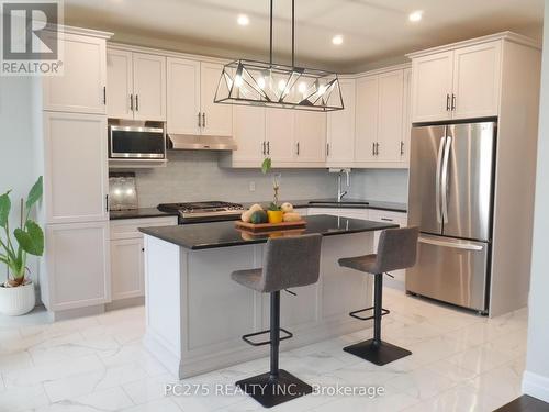 94 Beech Boulevard, Tillsonburg, ON - Indoor Photo Showing Kitchen With Upgraded Kitchen