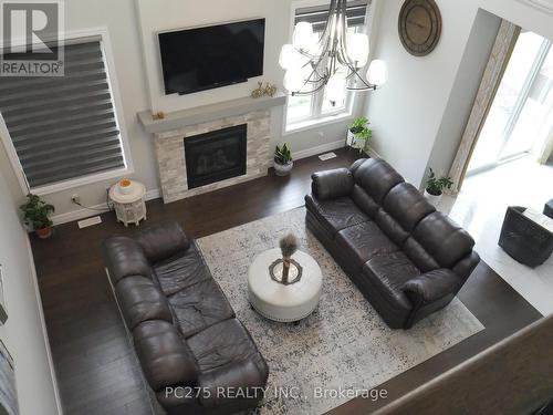 94 Beech Boulevard, Tillsonburg, ON - Indoor Photo Showing Living Room With Fireplace