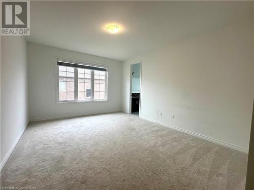 Empty room with carpet floors - 94 Milt Schmidt Street, Kitchener, ON - Indoor Photo Showing Other Room