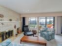 401-420 Linden Ave, Victoria, BC  - Indoor Photo Showing Living Room With Fireplace 