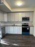 125 - 8175 Britannia Road, Milton, ON  - Indoor Photo Showing Kitchen With Double Sink 