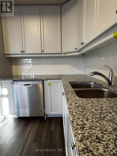 125 - 8175 Britannia Road, Milton, ON - Indoor Photo Showing Kitchen With Double Sink