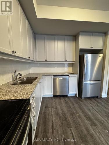 824 - 8175 Britannia Road, Milton, ON - Indoor Photo Showing Kitchen With Stainless Steel Kitchen With Double Sink