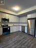 824 - 8175 Britannia Road, Milton, ON  - Indoor Photo Showing Kitchen With Stainless Steel Kitchen 