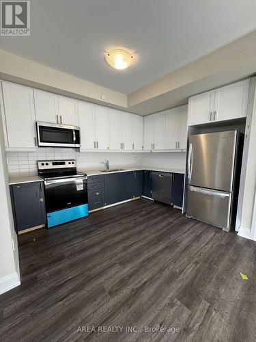 128 - 8175 Britannia Road, Milton, ON - Indoor Photo Showing Kitchen With Stainless Steel Kitchen