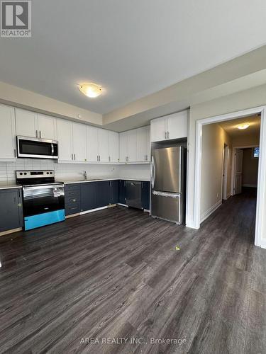 128 - 8175 Britannia Road, Milton, ON - Indoor Photo Showing Kitchen With Stainless Steel Kitchen