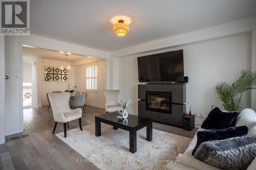 103 Kay Crescent, Centre Wellington, ON - Indoor Photo Showing Living Room With Fireplace