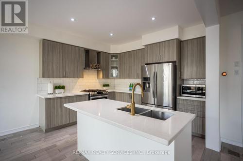 103 Kay Crescent, Centre Wellington, ON - Indoor Photo Showing Kitchen With Stainless Steel Kitchen With Double Sink With Upgraded Kitchen